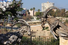 The Wooden Sculpture Of Goats In Mermerli Park, Antalya Turkey stock photos The Wooden Sculpture Of Goats In Mermerli Park, Antalya Turkey stock photos