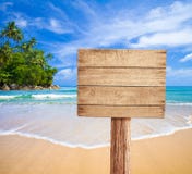 Wooden Signboard On Tropical Beach Royalty Free Stock Photos Wooden Signboard On Tropical Beach Royalty Free Stock Photos