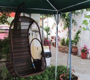 Wooden swing in the green garden royalty free stock photography Wooden swing in the green garden royalty free stock photography