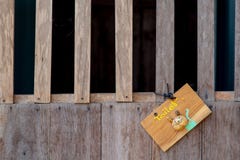 Wooden toilet sign hanging on the wooden door. royalty free stock photo Wooden toilet sign hanging on the wooden door. royalty free stock photo