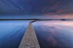Wooden Walkpath On Water At Dawn Stock Photography