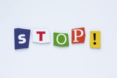 Word from cut letters STOP on white background. A word writing text showing STOP! Concept of the ban. White paper texture. stock photos Word from cut letters STOP on white background. A word writing text showing STOP! Concept of the ban. White paper texture. stock photos