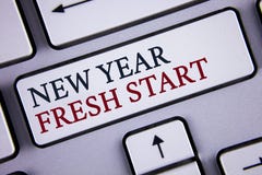 Word het schrijven de Nieuwe start van het tekstnieuwjaar Het bedrijfsconcept voor Tijd die resoluties te volgen bereikt uit droo stock foto's Word het schrijven de Nieuwe start van het tekstnieuwjaar Het bedrijfsconcept voor Tijd die resoluties te volgen bereikt uit droo stock foto's