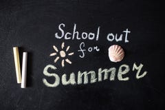The words School's Out written on a chalkboard stock photography The words School's Out written on a chalkboard stock photography