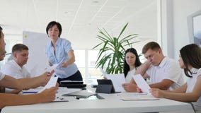 Work report In hands of director on Business meeting, communication of Colleagues at Job in modern office stock footage Work report In hands of director on Business meeting, communication of Colleagues at Job in modern office stock footage