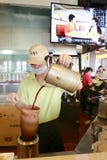 Worker making hong kong famous stockings milk tea stock photography Worker making hong kong famous stockings milk tea stock photography