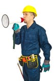 Worker man shouting in loudspeaker stock photo Worker man shouting in loudspeaker stock photo