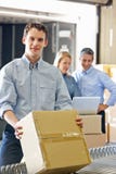Workers In Distribution Warehouse royalty free stock image Workers In Distribution Warehouse royalty free stock image