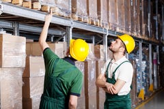 Workers in warehouse stock photos Workers in warehouse stock photos