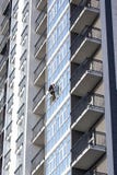 Working high-rise sets the Windows outside on the new building stock photography Working high-rise sets the Windows outside on the new building stock photography