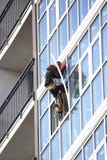 Working high-rise sets the Windows outside on the new building stock photography Working high-rise sets the Windows outside on the new building stock photography