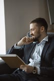 Man Working In Office Doing Notes stock image Man Working In Office Doing Notes stock image
