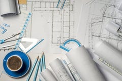 Workplace of architect - rolls and plans. stock photo Workplace of architect - rolls and plans. stock photo