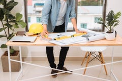 Workplace items tools for project, Architect or Engineer working on blueprint for architectural project in progress, construction stock photos Workplace items tools for project, Architect or Engineer working on blueprint for architectural project in progress, construction stock photos