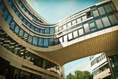 Worm's Eye View of Brown and Black Building Bridge Under Blue and White Cloudy Sky Royalty Free Stock Images Worm's Eye View of Brown and Black Building Bridge Under Blue and White Cloudy Sky Royalty Free Stock Images