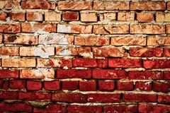 Worn red brick wall hald of deep red color royalty free stock photo Worn red brick wall hald of deep red color royalty free stock photo
