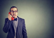 Worried man receiving bad news on phone royalty free stock images Worried man receiving bad news on phone royalty free stock images