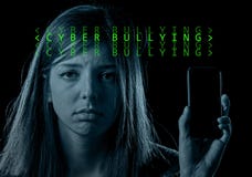 Worried teenager holding mobile phone as internet cyber bullying Stock Image Worried teenager holding mobile phone as internet cyber bullying Stock Image