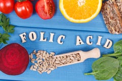 Wpisowy folic kwas z zdrowym odżywczym jedzeniem jako źródło kopaliny, witamina B9 i żywienioniowy włókno, obraz royalty free Wpisowy folic kwas z zdrowym odżywczym jedzeniem jako źródło kopaliny, witamina B9 i żywienioniowy włókno, obraz royalty free