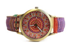 Wristwatches in hippie ethnic style on a white isolated background stock photo Wristwatches in hippie ethnic style on a white isolated background stock photo