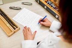 Writing ophthalmological scientific work Stock Images Writing ophthalmological scientific work Stock Images