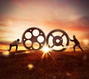 Współpraca przy pracy pojęciem z przekładnia mechanizmem fotografia stock Współpraca przy pracy pojęciem z przekładnia mechanizmem fotografia stock