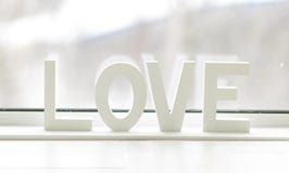 Wörter der Liebe auf einem schönen Hintergrund, zum Tag aller Liebhaber-, Romanze, leichten und schönenbuchstaben lizenzfreies stockbild Wörter der Liebe auf einem schönen Hintergrund, zum Tag aller Liebhaber-, Romanze, leichten und schönenbuchstaben lizenzfreies stockbild