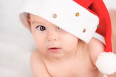 Xmas Card With Cute Baby Girl With Santa Hat On Beige Airy Briht Background With Copy Space Stock Photos Xmas Card With Cute Baby Girl With Santa Hat On Beige Airy Briht Background With Copy Space Stock Photos