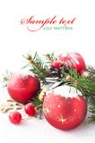 Xmas Tree And Baubles On The Snow Royalty Free Stock Photos