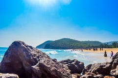 Yarada Beach, Visakhapatnam, India 10 December 2018 - People relaxing and enjoying in Yarada Beach. The Coast area is surrounded royalty free stock photo Yarada Beach, Visakhapatnam, India 10 December 2018 - People relaxing and enjoying in Yarada Beach. The Coast area is surrounded royalty free stock photo