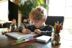 Young School Aged Child Working on Coloring Art Project Stock Photos Young School Aged Child Working on Coloring Art Project Stock Photos
