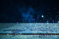 Yellow And Purple Glitter Lights Background. Vintage Sparkle Bokeh With Selective Focus. Defocused. On Wood Texture. Cool Blue Royalty Free Stock Image Yellow And Purple Glitter Lights Background. Vintage Sparkle Bokeh With Selective Focus. Defocused. On Wood Texture. Cool Blue Royalty Free Stock Image