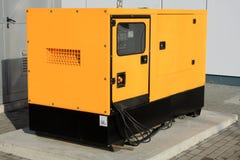 Yellow Auxiliary Diesel Generator for Emergency Electric Power Royalty Free Stock Photos Yellow Auxiliary Diesel Generator for Emergency Electric Power Royalty Free Stock Photos