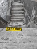 Yellow keep out sign on a metal chain blocking some concrete steps stock images Yellow keep out sign on a metal chain blocking some concrete steps stock images