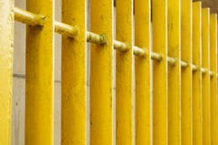 Yellow Metal Fence Stock Photography