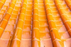 Yellow orange glazed terracotta roof tiles of a Chinese temple stock images Yellow orange glazed terracotta roof tiles of a Chinese temple stock images