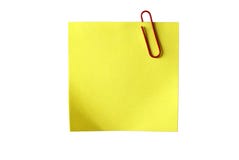 Yellow Sticky Paper With Red Clip. Isolated. Royalty Free Stock Image Yellow Sticky Paper With Red Clip. Isolated. Royalty Free Stock Image