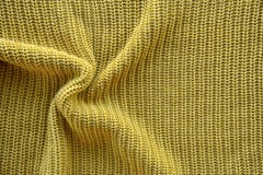 Yellow texture of a knitted English elastic pattern royalty free stock photos Yellow texture of a knitted English elastic pattern royalty free stock photos