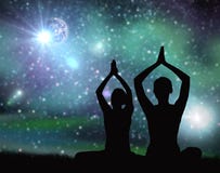 Black silhouette of couple meditating over space Stock Image Black silhouette of couple meditating over space Stock Image