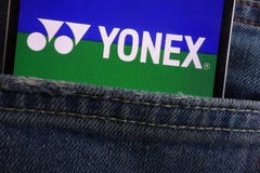 Yonex logo displayed on smartphone hidden in jeans pocket