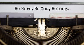 You belong here symbol. Words `Be here, be You, belong` typed on retro typewriter. Diversity, inclusion, belonging and you belon