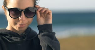Young adult model woman girl with sunglasses portrait stock video Young adult model woman girl with sunglasses portrait stock video