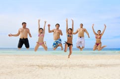 Young Adults Having Fun At The Beach Royalty Free Stock Photography