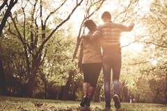African American couple in park walking and having convers royalty free stock photos African American couple in park walking and having convers royalty free stock photos