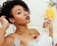 Young Afro-american Teen Girl Laying In Bath With Foam, Wearing Swag Jewelry Flawless, Making Selfie, Modern Lifestyle Royalty Free Stock Photo Young Afro-american Teen Girl Laying In Bath With Foam, Wearing Swag Jewelry Flawless, Making Selfie, Modern Lifestyle Royalty Free Stock Photo