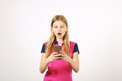 Beautiful natural blonde young woman posing, showing emotional facial expressions and making funny faces with smartphone stock images Beautiful natural blonde young woman posing, showing emotional facial expressions and making funny faces with smartphone stock images