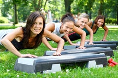 Young And Attractive People Doing Fitness Stock Photo