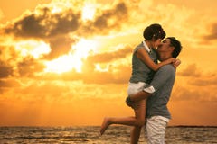 Young Asian Couple In Love Staying And Kissing On The Beach Royalty Free Stock Photo Young Asian Couple In Love Staying And Kissing On The Beach Royalty Free Stock Photo