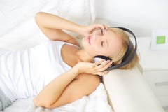 Young Attractive Girl Listening To Music In Headphones Royalty Free Stock Photo Young Attractive Girl Listening To Music In Headphones Royalty Free Stock Photo