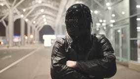 Young Attractive Man Motorcyclist With His Helmet And Custom Motorcycle On Night Street Royalty Free Stock Photos Young Attractive Man Motorcyclist With His Helmet And Custom Motorcycle On Night Street Royalty Free Stock Photos